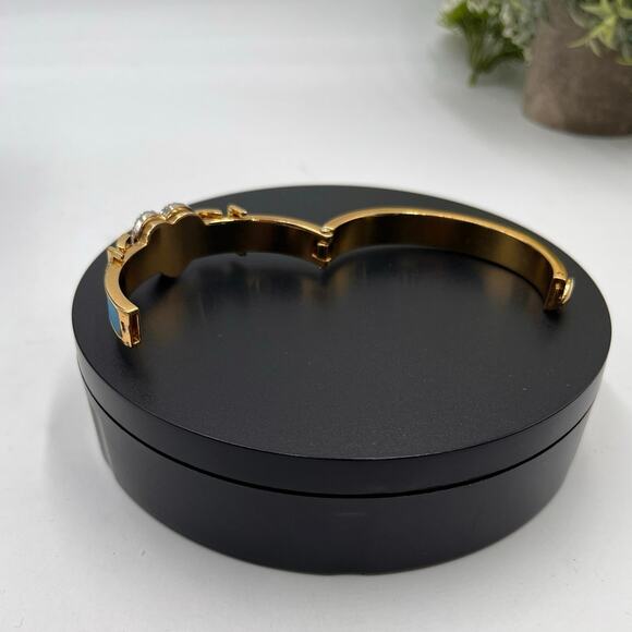 Juicy Couture Blue Leather Pave
Heart Hinged Gold Tone Buckle Bangle - Picture 8 of 9